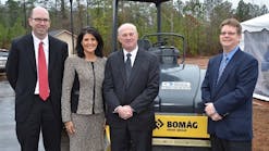 From left: Rob Muecker, vice president of sales and marketing, Bomag Americas; Walter Link, president, Bomag Americas; Gov. Nikki Haley, governor of South Carolina and Dave Dennison, marketing manager, Bomag Americas, along with Bomag tandem vibratory roller.