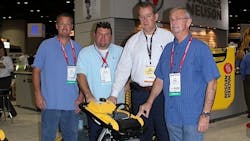 Jeremy Cousins Mike Cousin and Gary Branam of BampM Equipment Rentals receive a new rammer from Wacker Neuson at the Rental Show Second from right is Christopher Barnard president and CEO of Wacker Neuson Corp Jeremy Cousins Mike Cousin and Gary Branam of BampM Equipment Rentals receive a new rammer from Wacker Neuson at the Rental Show Second from right is Christopher Barnard president and CEO of Wacker Neuson Corp