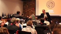 Chicago Pneumatic executive vice president John Vogel hands out an award at the companyrsquos sales meeting at ARA Chicago Pneumatic executive vice president John Vogel hands out an award at the companyrsquos sales meeting at ARA