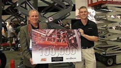 Skyjack president Brad Boehler right shows off the companyrsquos 100000th scissorlift sold to Rick Dahl left of Metrolift Photo by Michael Roth RER Skyjack president Brad Boehler right shows off the companyrsquos 100000th scissorlift sold to Rick Dahl left of Metrolift Photo by Michael Roth RER