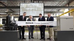 Kohler chairman Herb Kohler, second from left, cuts the ribbon at the company&rsquo;s 105,000-square-foot addition to its Mosel, Wis., generator manufacturing plant. At left is Larry Bryce, president Kohler Power Systems. Also pictured are David Kohler, president of Kohler Co., and John Brickner, Kohler Power Systems director of marketing.