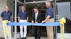 Mayor Dale Archer, second from right, cuts the ribbon at Trico Lift&rsquo;s new Mickleton, N.J., headquarters. Also pictured, from left, are Trico CFO Mike Timken, board chairman John Michael Paz, and Trico Lift president and CEO Chris Carmolingo.