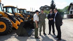 Preparing to hand over the backhoe from left Lt Col Rob Tomlinson of the British Embassy General Sakib Foric of the Bosnian Army Sinisa Tomasic regional director of TERRA South and Tarik Kamenjasevic managing director of Terra BiH Preparing to hand over the backhoe from left Lt Col Rob Tomlinson of the British Embassy General Sakib Foric of the Bosnian Army Sinisa Tomasic regional director of TERRA South and Tarik Kamenjasevic managing director of Terra BiH