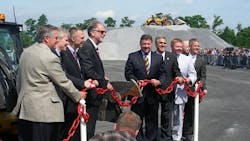 Volvo CE officials and political dignitaries participate in a unique form of ribbon cutting Photo by Michael Roth RER Volvo CE officials and political dignitaries participate in a unique form of ribbon cutting Photo by Michael Roth RER