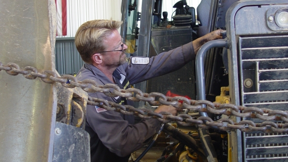 Coastline Equipment service technician Eric Olson works on equipment at the companyrsquos Long Beach Calif location Dealerships often handle complex repair jobs for rental companies as well as end users