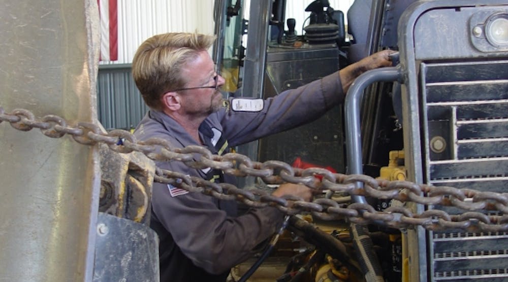 Coastline Equipment service technician Eric Olson works on equipment at the company&rsquo;s Long Beach, Calif., location. Dealerships often handle complex repair jobs for rental companies as well as end users.