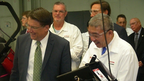 North Carolina Gov Pat McCrory and Shinji Oketani Honda Power Equipment president visit the assembly line during the celebration of Honda39s 30 years in Swepsonville NC Photo by Michael Roth RER
