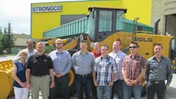 Strongco employees in Calgary Alberta celebrate the addition of SDLG wheel loaders to its fleet Strongco employees in Calgary Alberta celebrate the addition of SDLG wheel loaders to its fleet