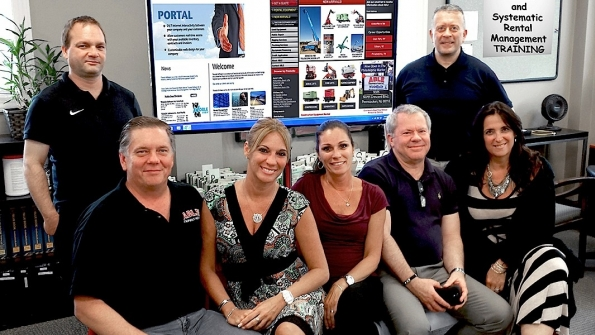 John Hellens standing left Texada team leader client services with members of Able Equipmentrsquos administrative staff