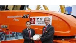 Jiayin Wang president of Shanghai Horizon Equipment amp Engineering Co celebrates his companyrsquos purchase with a commemorative plate offered by JLG Industries president Frank Nerenhausen Jiayin Wang president of Shanghai Horizon Equipment amp Engineering Co celebrates his companyrsquos purchase with a commemorative plate offered by JLG Industries president Frank Nerenhausen