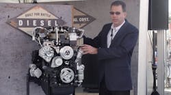 Kohler Engines product manager Jeff Wilke shows off the 3404 at the World of Concrete.