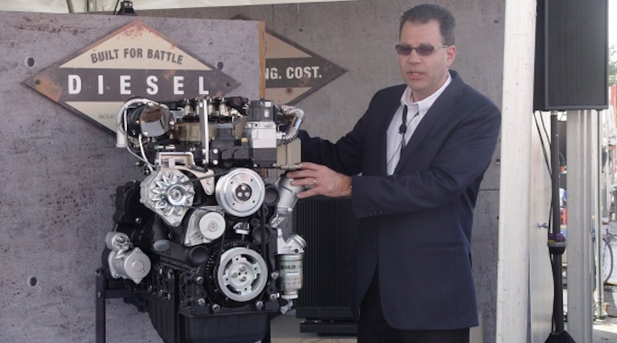Kohler Engines product manager Jeff Wilke shows off the 3404 at the World of Concrete.