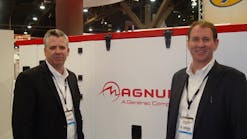 Terry Dolan, Generac executive vice president, left, and Magnum vice president sales &amp; marketing Mark Hanson, show the MMG 45 mobile generator set at the World of Concrete.