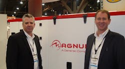 Terry Dolan, Generac executive vice president, left, and Magnum vice president sales &amp; marketing Mark Hanson, show the MMG 45 mobile generator set at the World of Concrete.