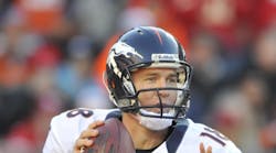 Peyton Manning prepares to throw a pass. The legendary quarterback told the Rental Show audience willingness to make tough decisions is as important in business as it is on the football field.