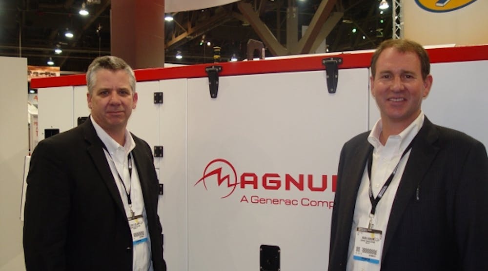 Terry Dolan, executive vice president of Generac&apos;s mobile products division, left, and Mark Hanson, vice president of sales and marketing, with the company&apos;s MMG45 at a recent trade show.