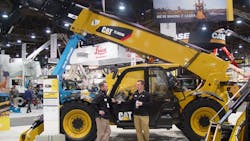 Caterpillar displays a telehandler at the World of Concrete show Caterpillar displays a telehandler at the World of Concrete show