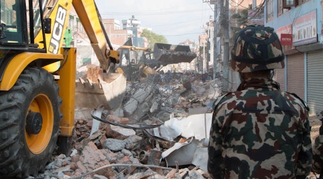 JCB equipment clearing rubble after the earthquakes in Nepal. The manufacturer donated more than $1.25 million worth of equipment to help with relief and reconstruction efforts.