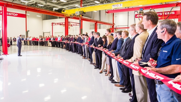 Hilti staff prepares to cut the ribbon at its new Western Hemisphere Product Development and Tool Service Center facility in Irving Texas