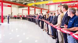 Hilti staff prepares to cut the ribbon at its new Western Hemisphere Product Development and Tool Service Center facility in Irving, Texas.