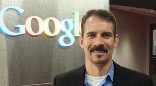 Point-of-Rental Software CEO Wayne Harris at Google headquarters with finalist plaque.