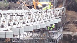 Spider provides a 20-foot-wide by 24-foot-long NextGen float platform, equipped with four double-lined SC1000 air hoists to give workers sufficient space to dismantle an old beam below the bridge and install a new one.