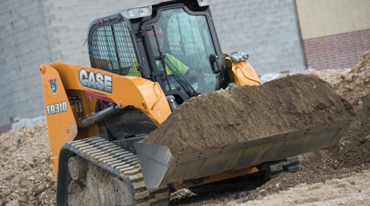 A Case TR310 compact track loader at work on a jobsite.