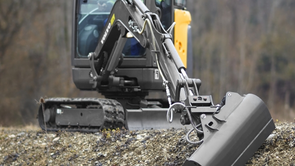 Tilt buckets are offered in a range of sizes and are used for landscaping finish work such as finishing sand traps on golf courses