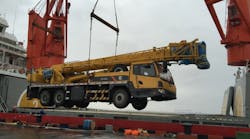 The LiuGong TC250-4 crane is loaded onto a ship in Shanghai bound for Antarctica for loading and unloading cargo, truck hoisting and house repair work at a Chinese research facility.