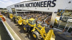 Wheel loaders being auctioned in Orlando, Fla., last year.