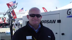 Jeremy Bailey air products manager Americas Doosan Portable Power shows the companyrsquos generators at World of Concrete last week