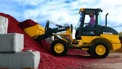 Deere remains profitable despite weakness in the global farm economy and softer buying in construction markets