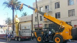 The 24foothigh Oscar statues around the Dolby Theatre are put in place by a JCB 51256 rented by Alliance Rental Solutions The 24foothigh Oscar statues around the Dolby Theatre are put in place by a JCB 51256 rented by Alliance Rental Solutions