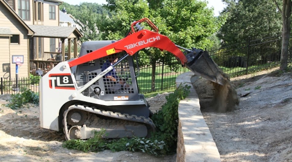 The Takeuchi TL8 compact track loader features a radial lift loader design and provides traction forces of more than 9,100 pounds.