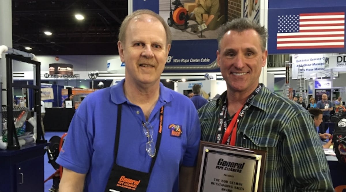 Mark Uebner, right, accepts the Bob Gelman Outstanding Rental Representative Award from Andy Zelazny, national sales manager, General Pipe Cleaners.