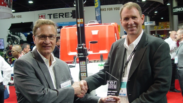 RER39s James Carahalios left presents Generac39s vice president of sales Mark Hanson right wth RER39s Innovative Product Award in the light tower category at the recent Rental Show