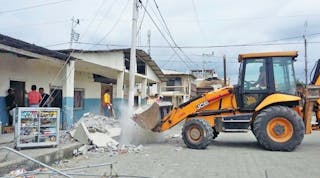 JCB&apos;s 3CX backhoe loader helps move rubble in Ecuador.