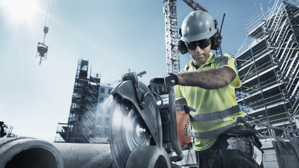 A Husqvarna concrete saw at work