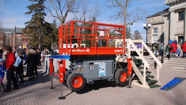 Skyjack39s SJ6832 RT rough terrain scissorlift preparing to be used as a camera platform at Special Olympics Ontario39s Polar Plunge