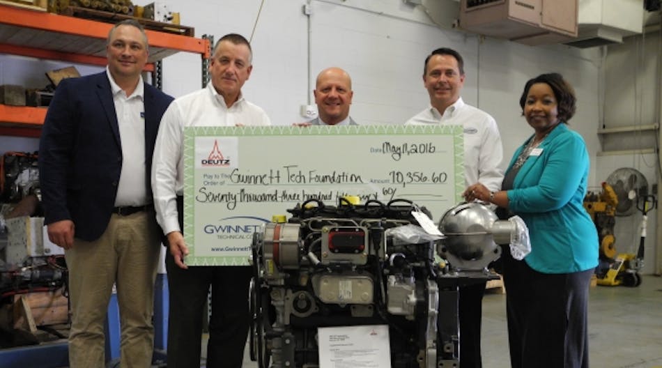 Deutz staff presents a check and seven diesel engines to Gwinnett Technical College. From left: Mike Price, general manager, Nidec Elesys Americas Corp. and Gwinnett Tech Foundation chair; Robert Mann, president and CEO, DEUTZ Corp.; Dr. D. Glenn Cannon, president of Gwinnett Technical College; Matthew Holtkamp, owner of Holtkamp Heating and Air and member of the Gwinnett Tech Foundation Board of Trustees; Gail Edwards, dean of automotive and trades at Gwinnett Technical College.
