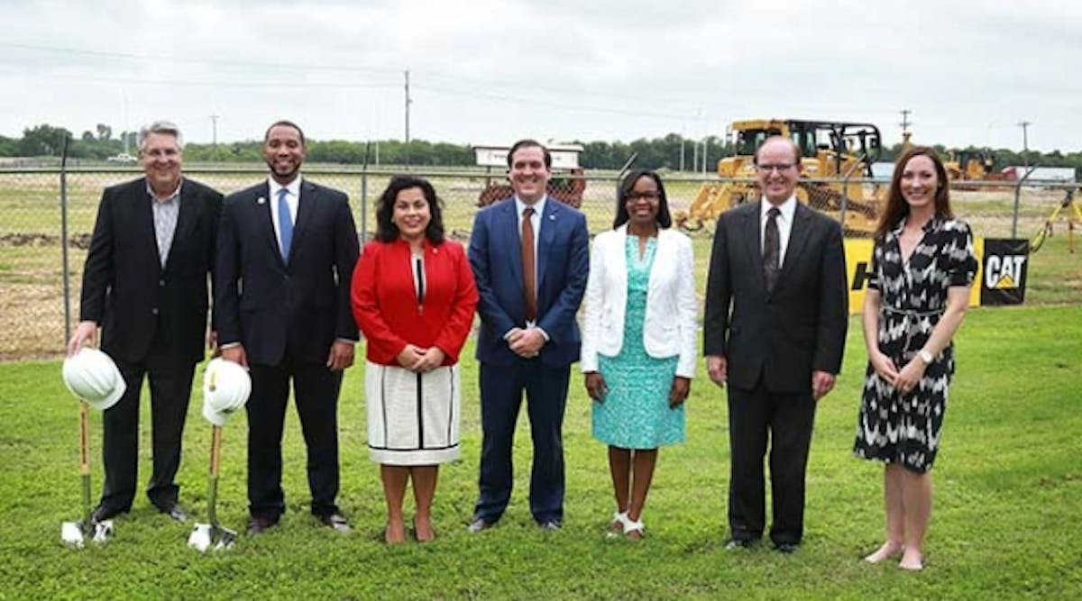 Holt Cat executives and city officials at the Holt groundbreaking including, from left: Dave Harris, president of Holt Cat; Tommy Calvert, Bexar County Commissioner; Rebeca Villagran, city councilwoman; Peter John Holt, executive VP and GM; San Antonio Mayor Ivy Taylor; county judge Nelson Wolff; and Corinna Holt Richter, executive VP and chief administrative officer, Holt Cat.