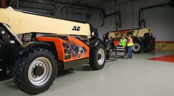 Mechanics at work on a JLG telehandler Mechanics at work on a JLG telehandler