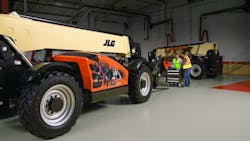 Mechanics at work on a JLG telehandler Mechanics at work on a JLG telehandler