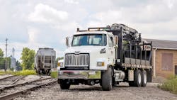 A NESCO grapple truck upfitted by newly acquired VampH Leasing Services A NESCO grapple truck upfitted by newly acquired VampH Leasing Services