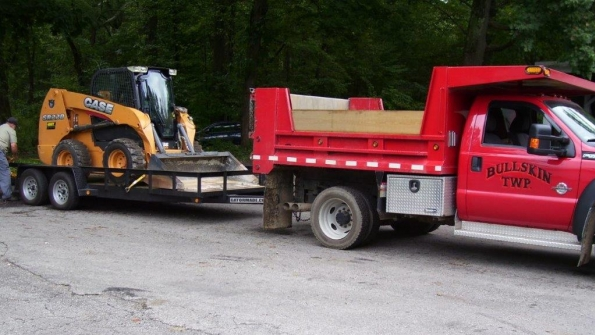 Groff Tractor a Case CE dealer sends a Case SR220 to Bullskin Township Pa to help with cleanup efforts after massive flooding hits Connellsville and Bullskin Pa