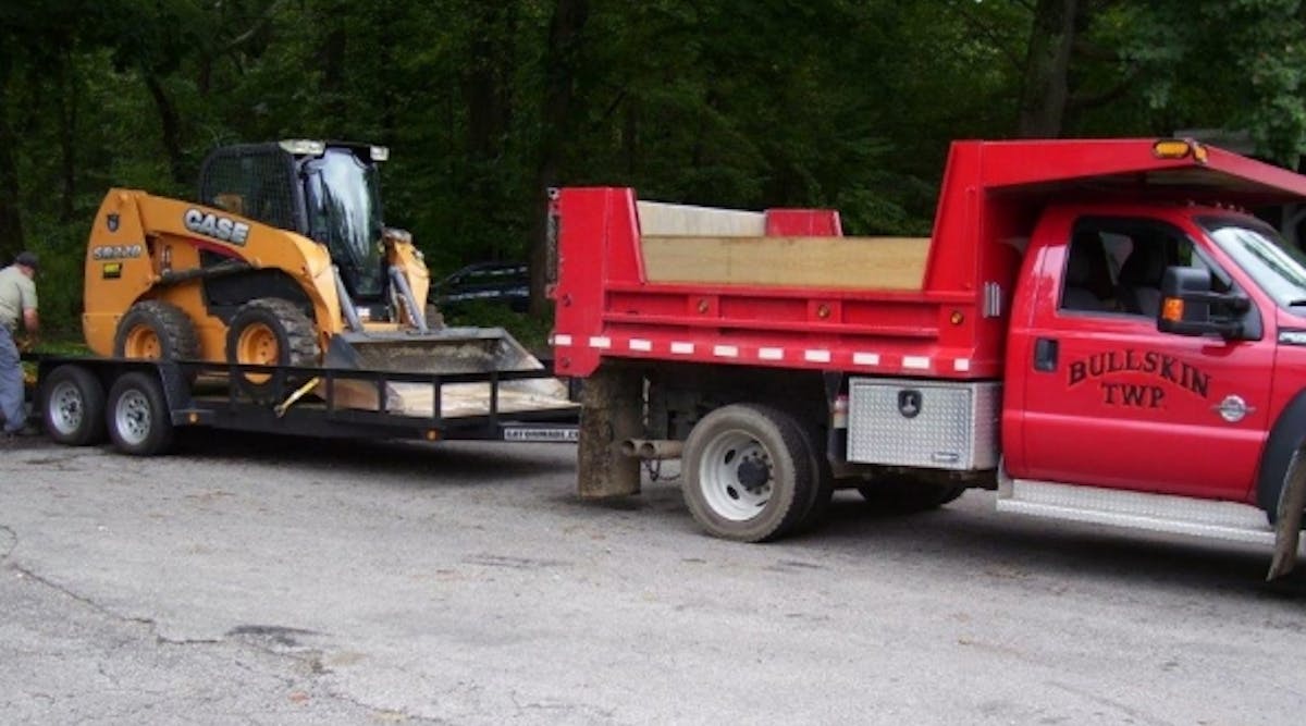 Groff Tractor, a Case CE dealer, sends a Case SR220, to Bullskin Township, Pa., to help with clean-up efforts after massive flooding hits Connellsville and Bullskin, Pa.