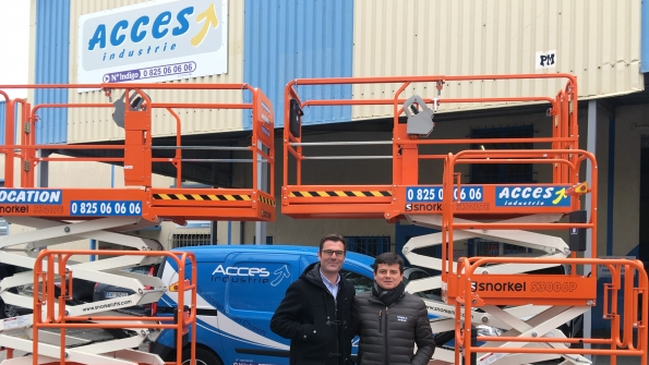 Acces Industrie sales director David Beltrame and regional director Emmanuel CleyetMaret with new Snorkel machines at Acces Industrie39s Lyon France branch