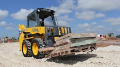 A Gehl R135 skid-steer loader with pallet forks. Gehl, along with Manitou and Mustang, will introduce 24 new products at ConExpo 2017.