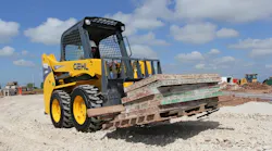A Gehl R135 skidsteer loader with pallet forks Gehl along with Manitou and Mustang will introduce 24 new products at ConExpo 2017