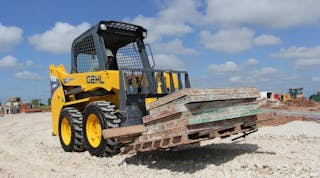 A Gehl R135 skid-steer loader with pallet forks. Gehl, along with Manitou and Mustang, will introduce 24 new products at ConExpo 2017.